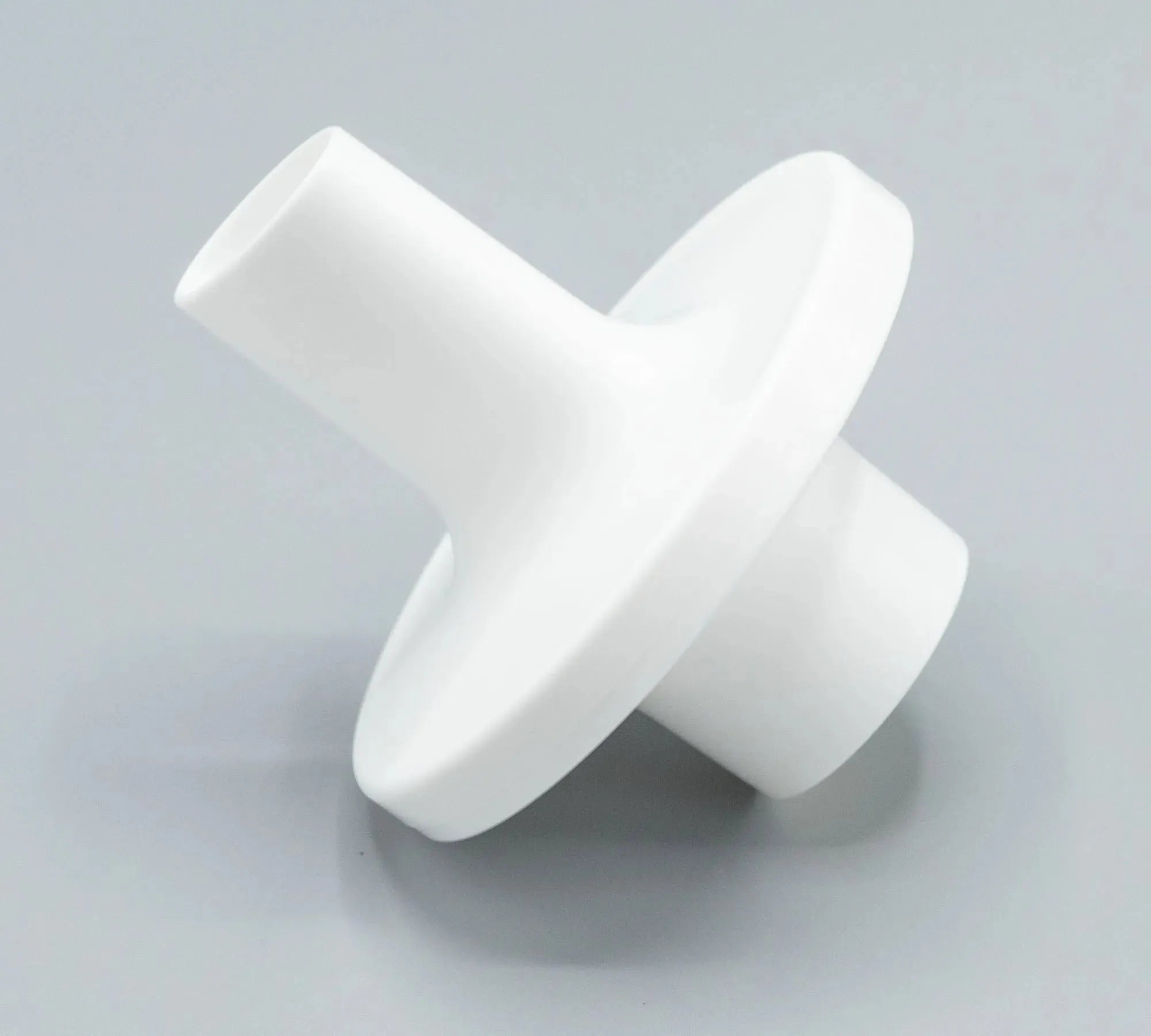 The PFT Elliptical Filter mouthpiece is elliptical in shape and white in color.