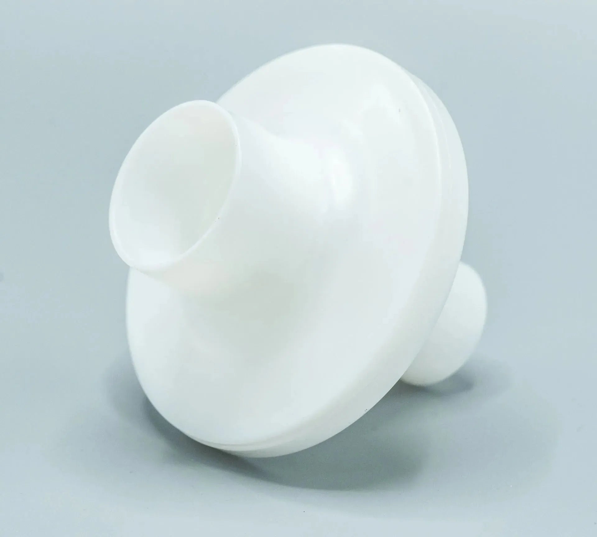 The Polytechnic Round bacterial viral filter is round in shape and white in color.